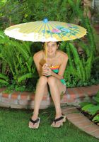 Zoey Kush Poses With her Yellow Umbrella, Zoey Kush (jad024) ATK Archives: Zoey Kush (Zoey Kush Poses With her Yellow Umbrella)