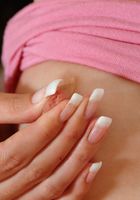 ATK Archives: Kristy (Naughty babe Kristy teases with her feet.)