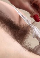 Lisa pulls her tight pants down., Lisa Leigh (lis049) ATK Natural & Hairy: Lisa Leigh (Lisa pulls her tight pants down.)