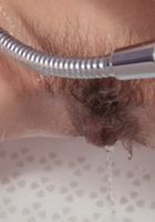 Loredana in the shower peeing and cleaning., Loredana (lor045) ATK Natural & Hairy: Loredana (Loredana in the shower peeing and cleaning.)